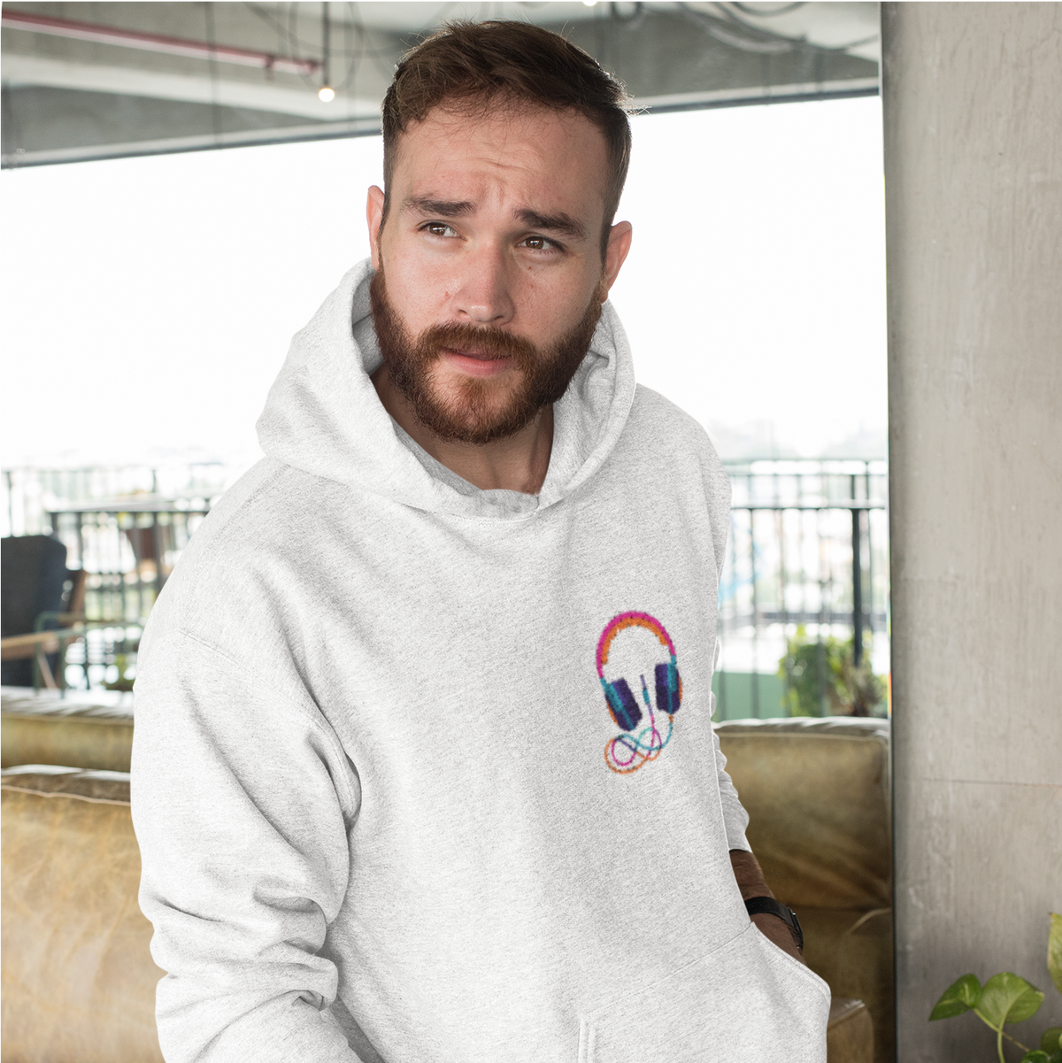 Men's white headphones are printed with an oversized hoodie of regular length and a relaxed fit. Crafted from 100% cotton, machine washable, and out of stock in all sizes.