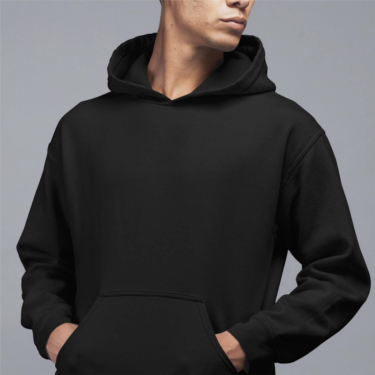 Oversized hoodie men’s fashion. Black cropped men’s sweatshirt for stylish outfits. A must-have in hoodie essentials!
