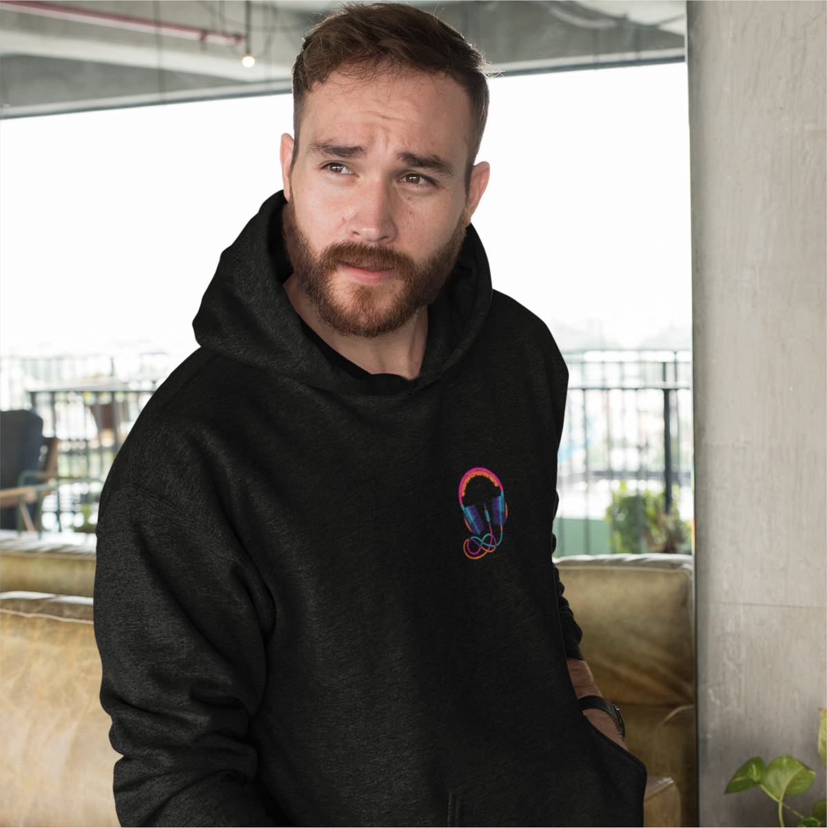 Shop this comfortable black oversized hoodie for men with headphone print, made of 100% cotton for a relaxed fit.