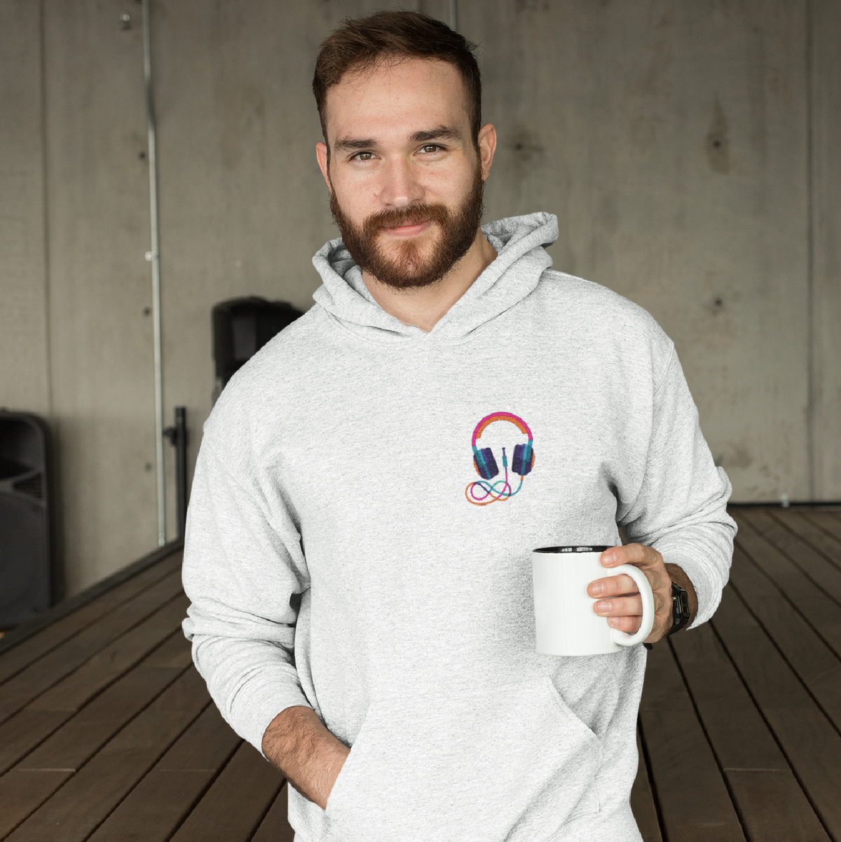 Sold out Headphone Oversized Hoodie in white, with a graphic print, cuffed sleeves, and hooded collar. Made of 100% cotton, care instructions include cold machine wash.