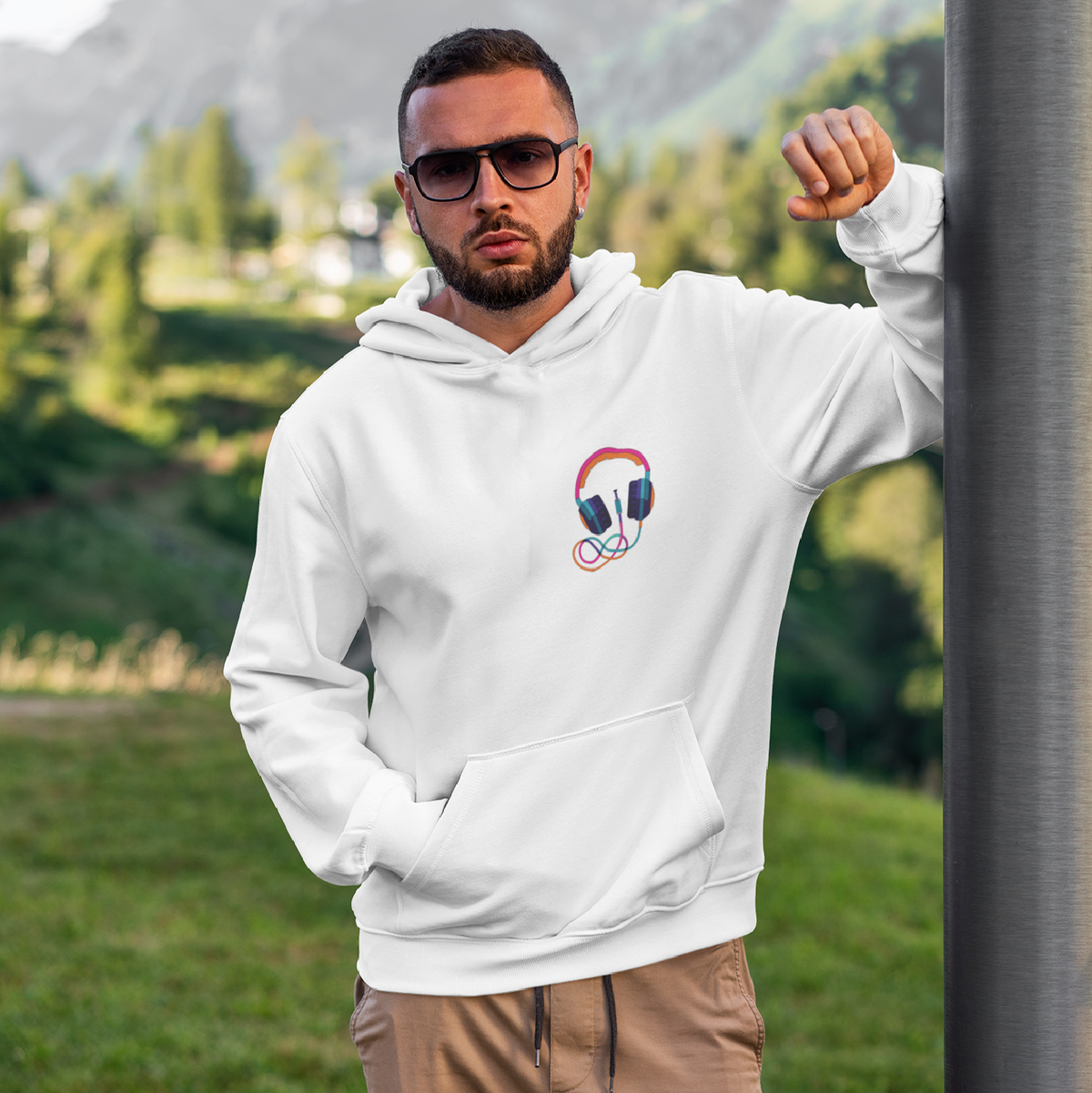 White Headphone Oversized Hoodie with a graphic design, featuring cuffed sleeves and a hooded collar. Currently sold out, originally priced at Rs. 3,499, now available for Rs. 1,149.