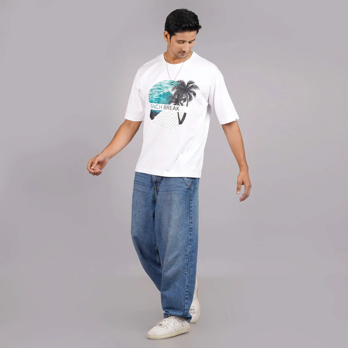 Beach Break white t-shirt for men with graphic print, drop shoulders, and a comfortable round collar. Buy now online.