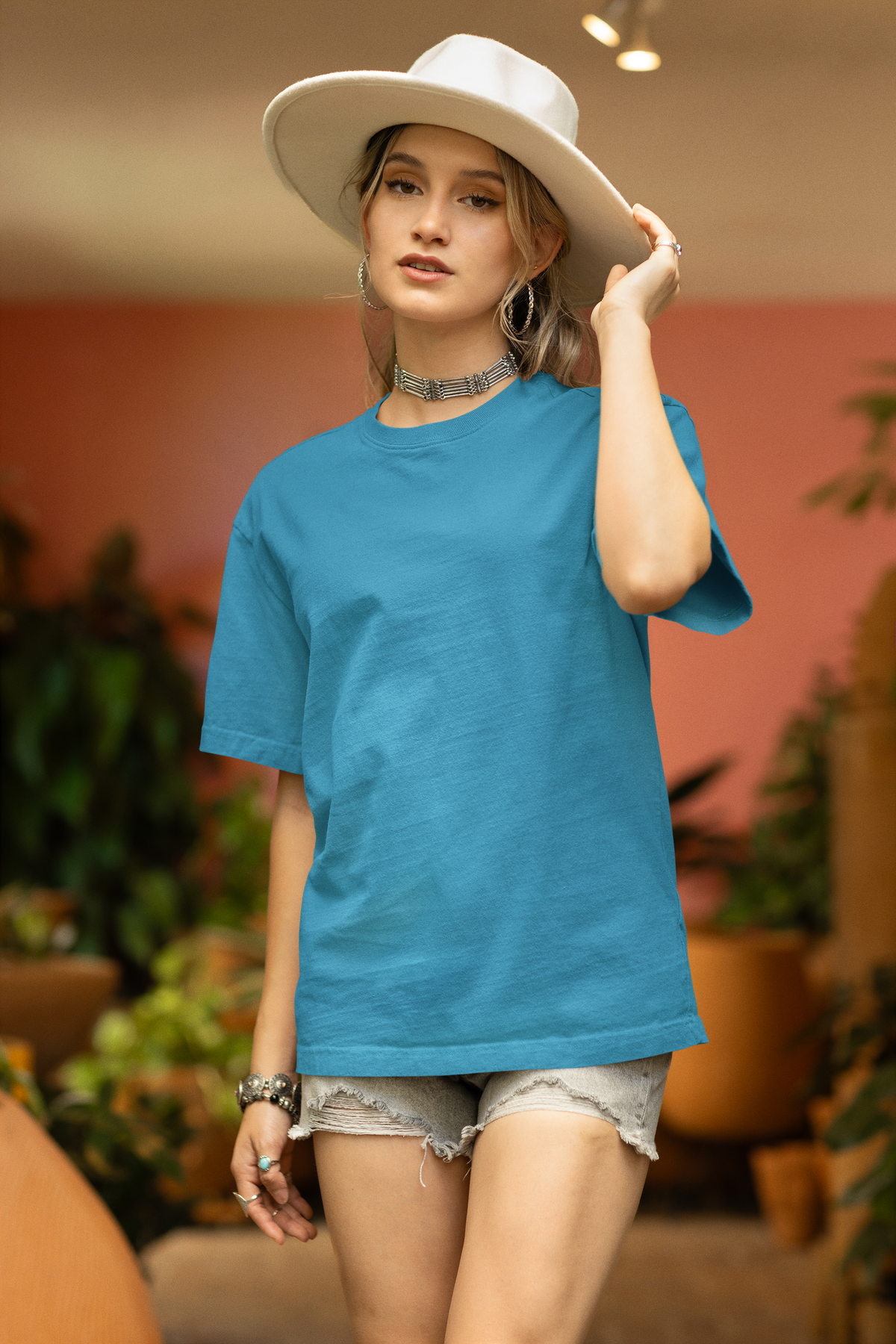 Buy 100% cotton oversized T-shirt in Command Blue, featuring drop shoulders and a trendy graphic print for ultimate comfort and style.