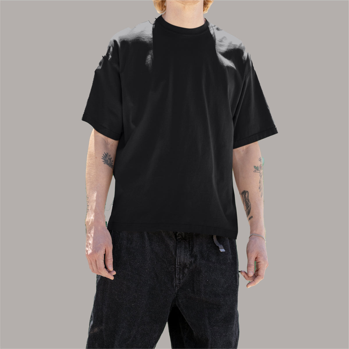 Buy Black Oversized T-Shirt – Trendy and versatile for casual or streetwear looks.
