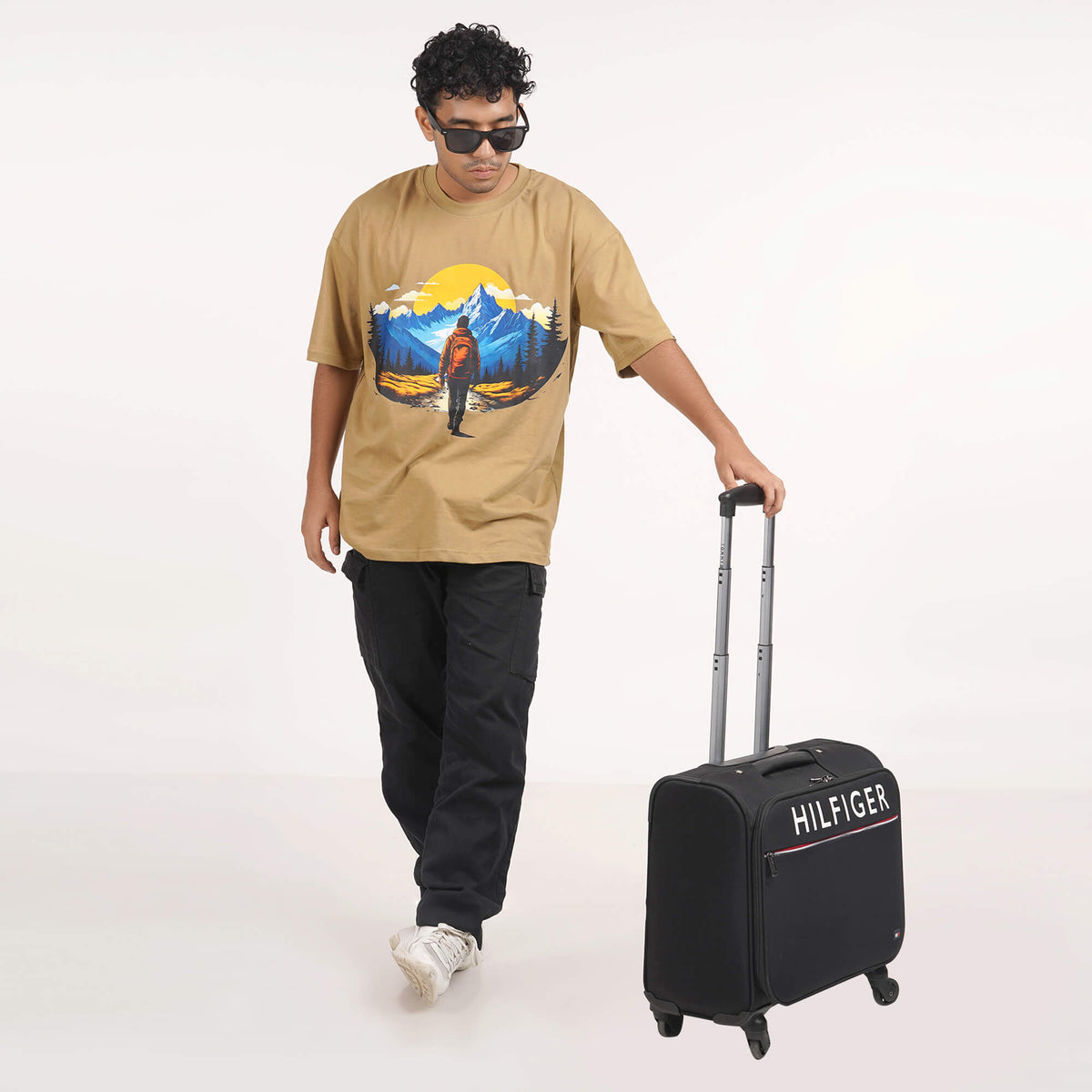Buy Men's beige oversized Sunset T-shirt featuring a soft drop shoulder design and round collar, crafted from 100% cotton.