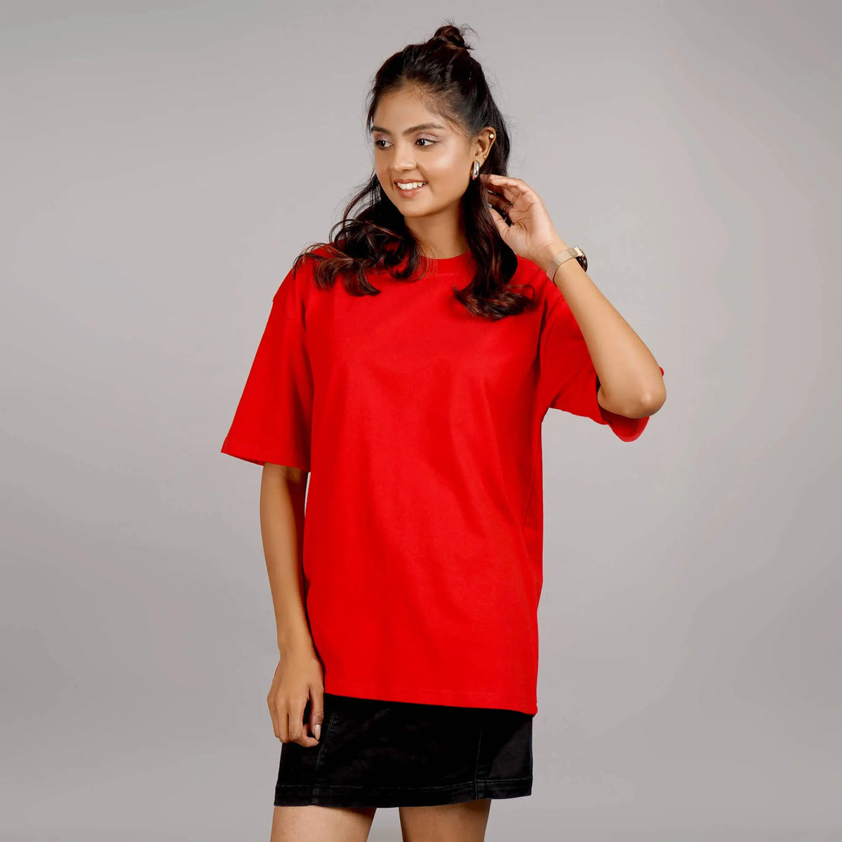 Buy Red oversized T-shirt for women with a drop shoulder design and round collar, made from soft cotton.