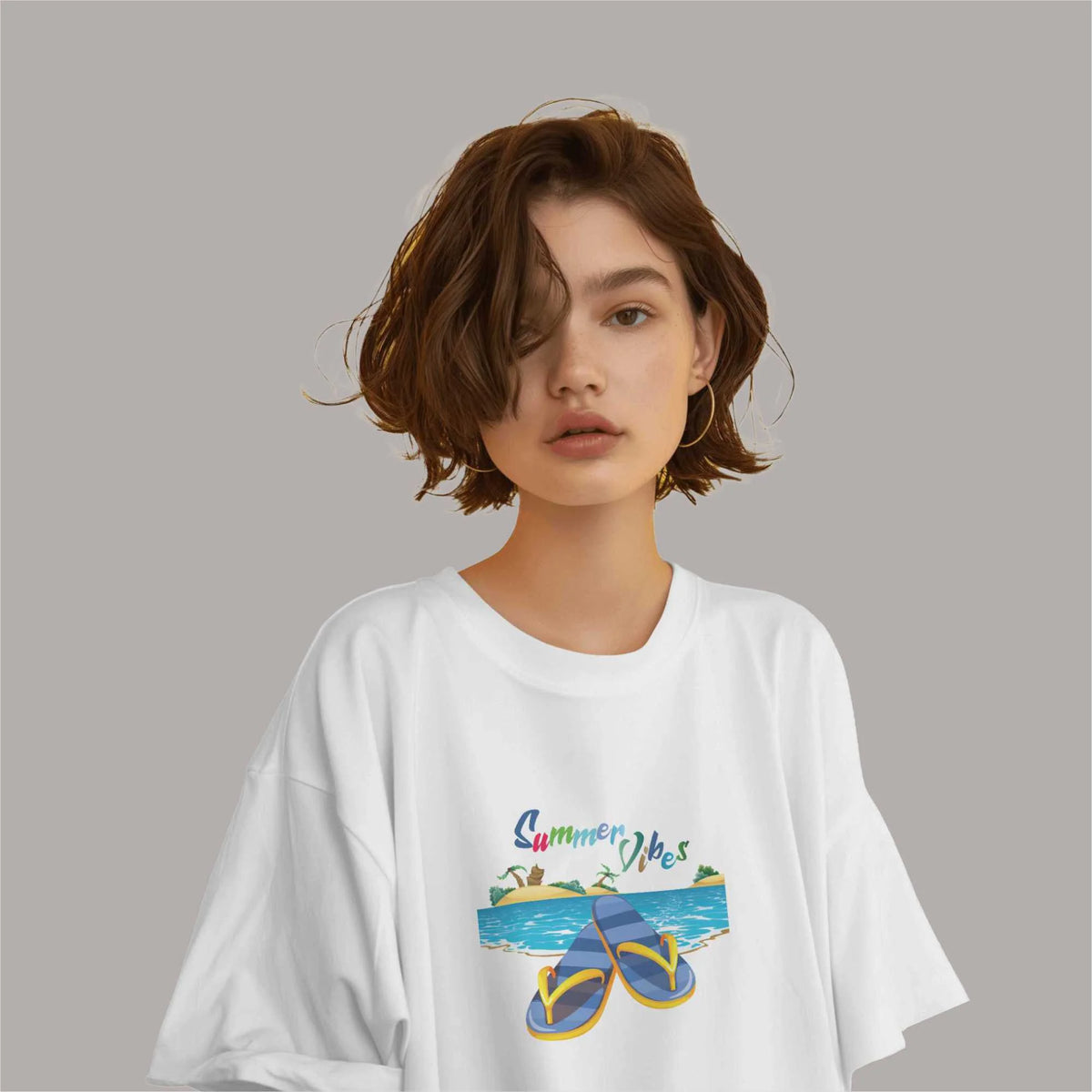White oversized T-shirt with 'summer Vibes' graphic print for summer. Drop shoulders, round collar, and soft cotton. Shop online