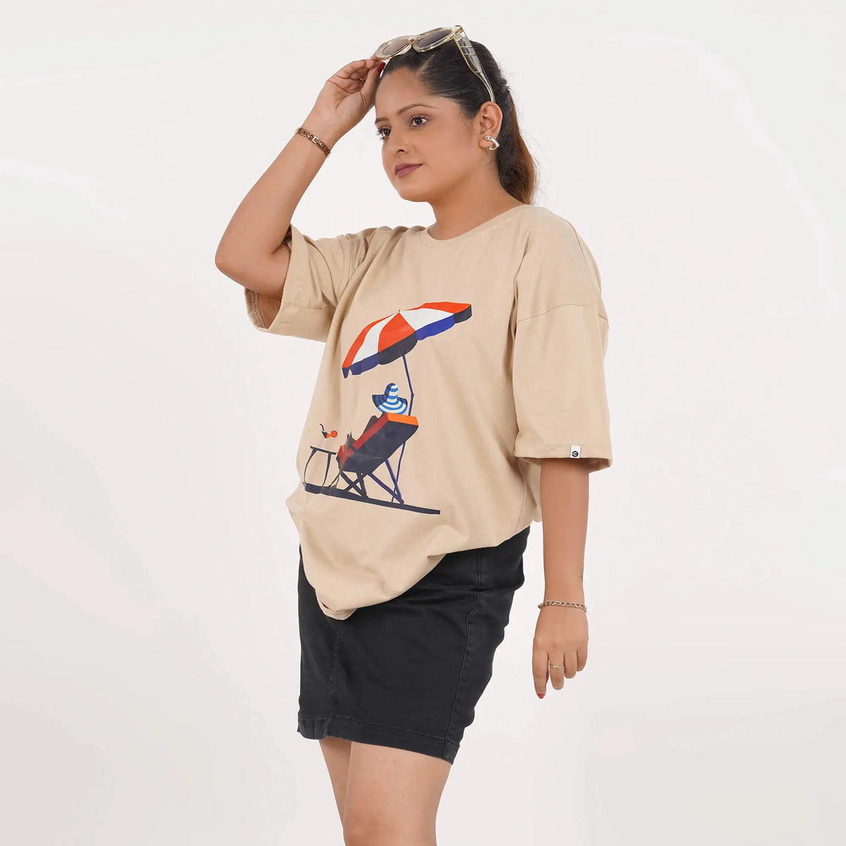 Buy online: Sun Beach beige T-shirt, oversized fit, round neck, drop shoulders, 100% cotton, beach print.