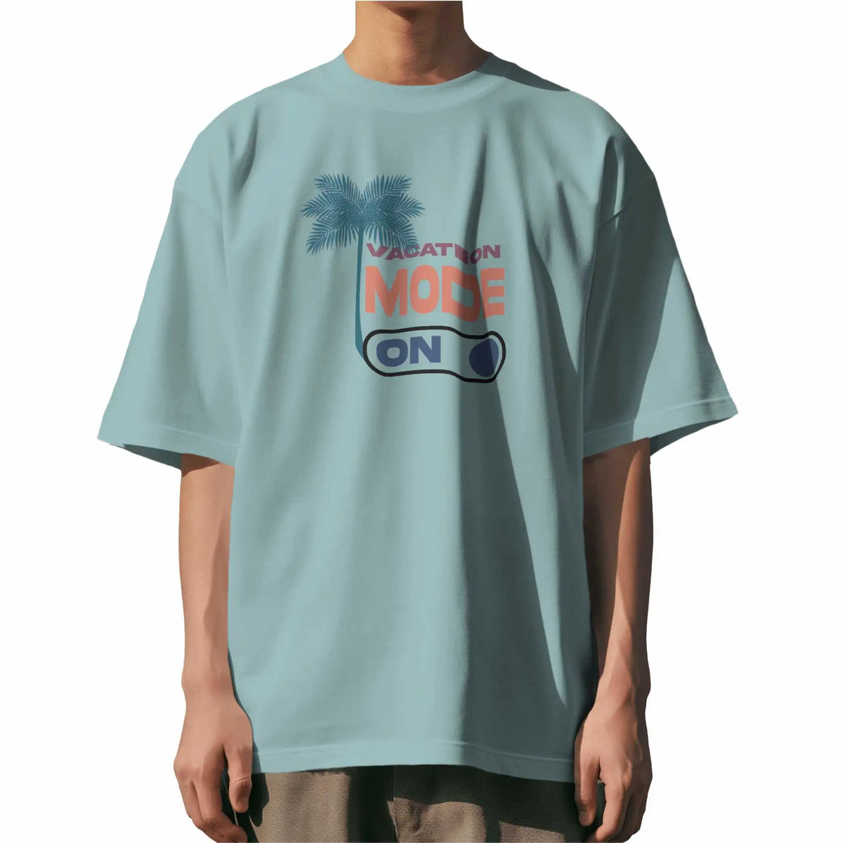Vacation Mode On :  Contemporary aqua blue oversized T-shirt with 'Vacation Mode On' graphic, drop shoulders, round collar