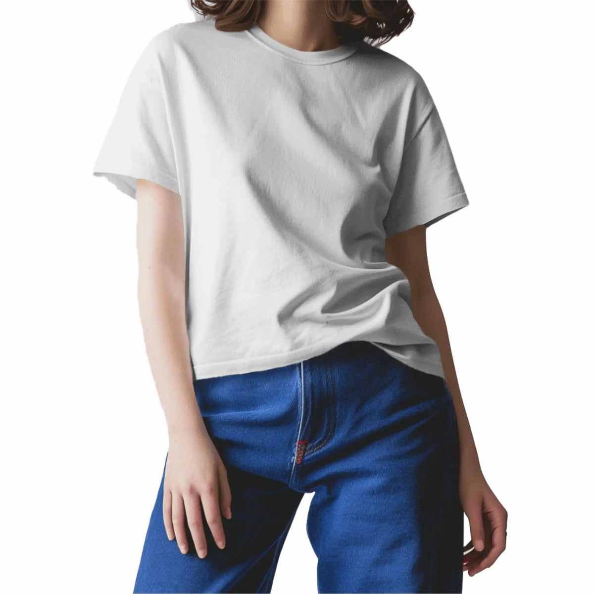 buy White oversized T-shirt for women featuring a plain design, drop shoulders, and a round collar. Crafted from cotton for ultimate comfort. Available online now
